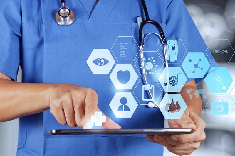 Doctor with mobile working solution with ipad