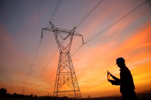 Utilities staff with field workforce management solution