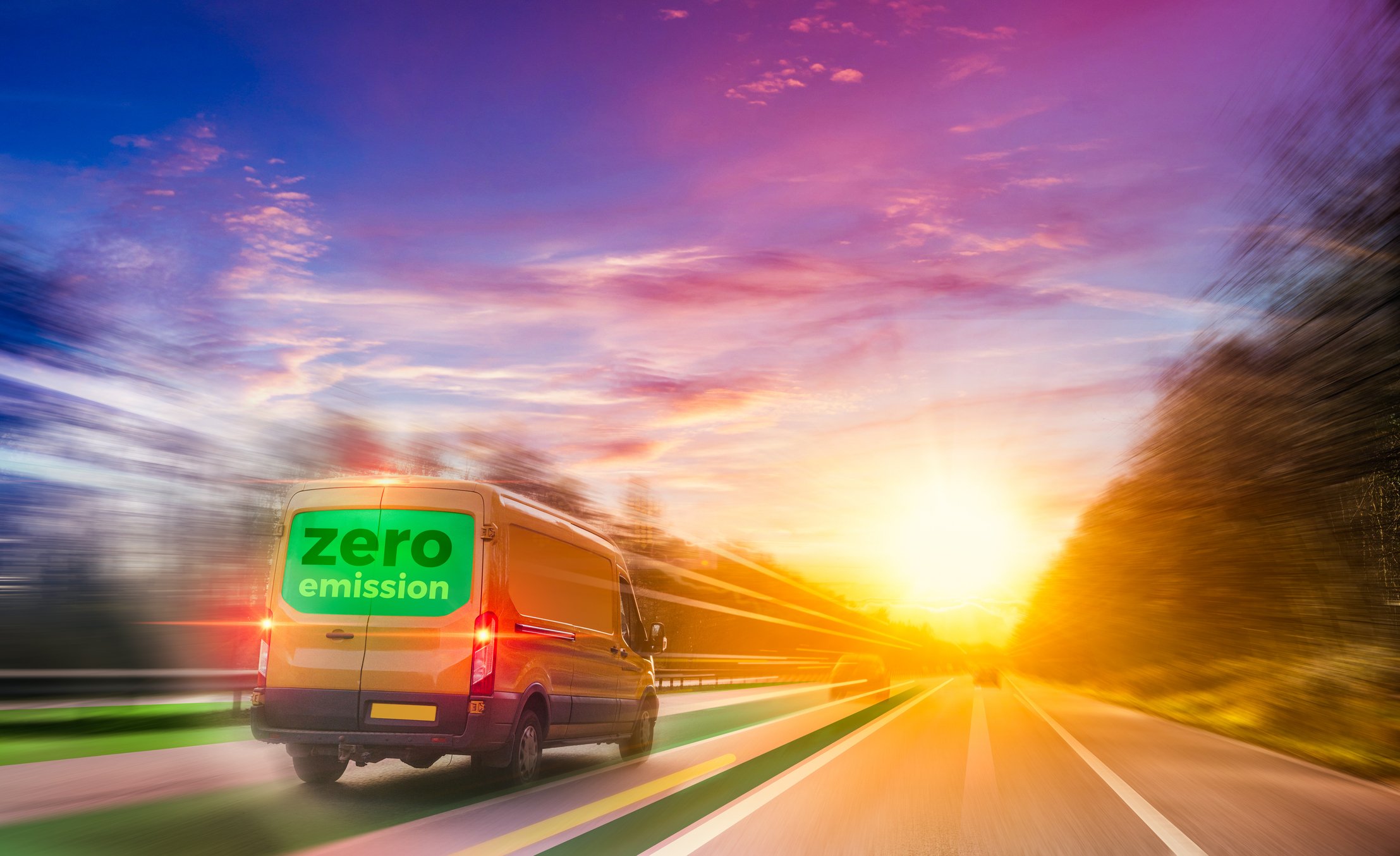 Field service management best practices blog hero image of delivery van driving on motorway with 'zero emissions' written across the back.